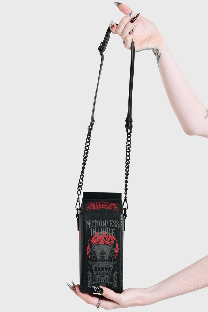 MOTIONLESS MILK HANDBAG
