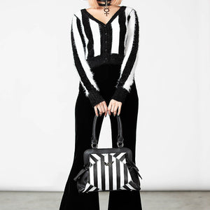 Never Trust The Living Handbag